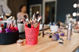 Close-up photo of make-up brushes in beauty salon.